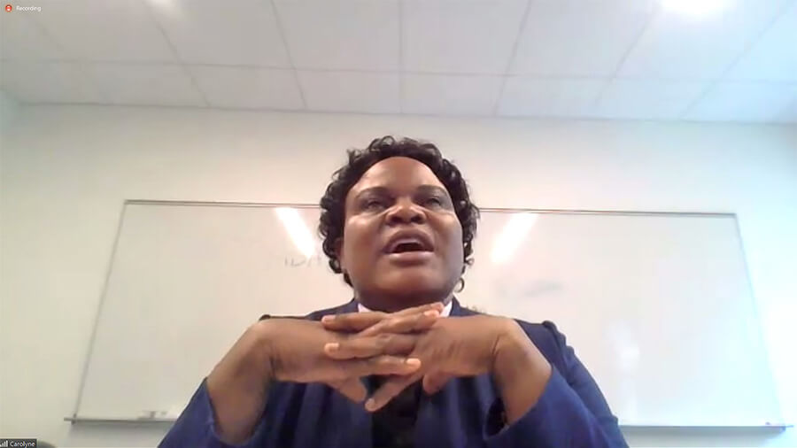 The Rev. Carolyne Adhola, a priest of the Anglican Church in Kenya, describes her work to combat gender-based discrimination and to spread the gospel. Screenshot, Melodie Woerman.