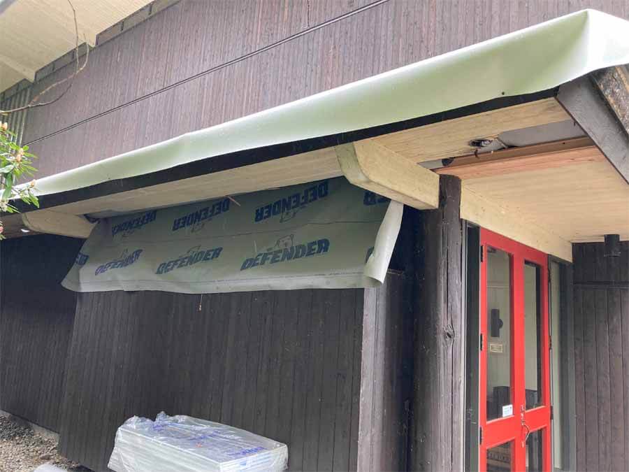 May 2022 narthex roof damage looking at the front doors