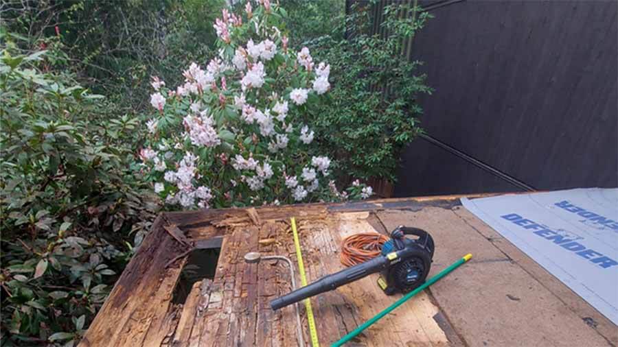 May 2022 narthex roof damage looking east towards the Memorial Garden