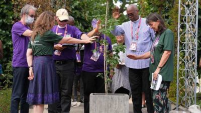 Bishops attending the Lambeth Conference bless a tree in the newly launched Communion Forest initiative, part of the bishops’ focus on the environment and climate change during a trip Aug. 3 to London and Lambeth Palace. Among the bishops shown are California Bishop Marc Andrus, in hat, and Central America Archbishop Julio Murray, to the right of the tree. Photo: Lambeth Conference.