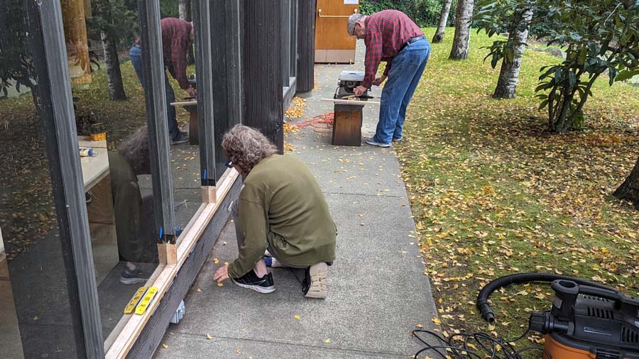 Working on the window wall of the Parish Hall in October 2023
